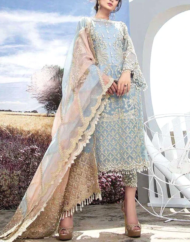 Adorable Organza Dress in blush/pastel tone with heavy handwork of pearls, zari, and sequins
